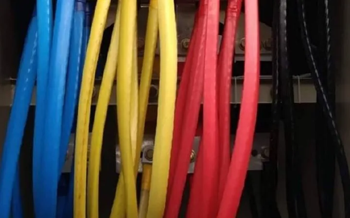 Multiple LT cable runs terminated onto panel busbars