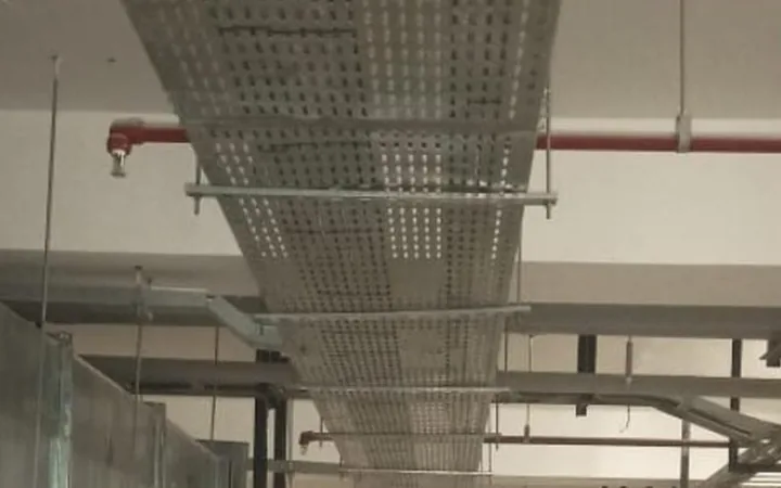 Perforated cable tray installation in a commercial building